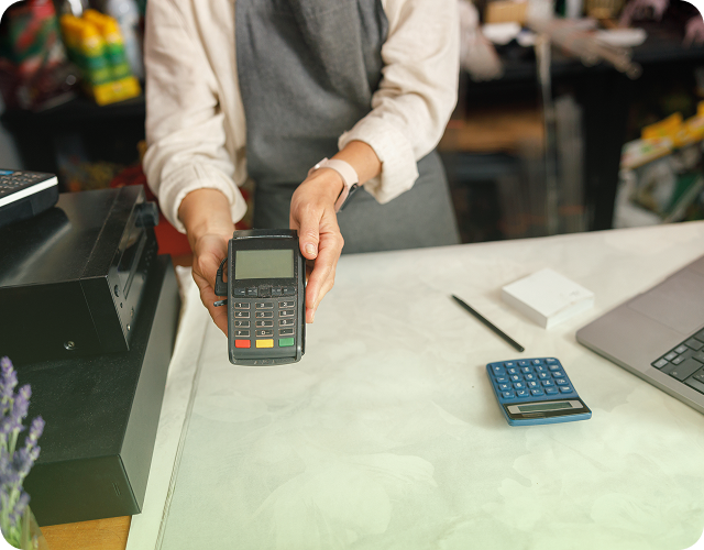 Customer making a payment using a POS terminal